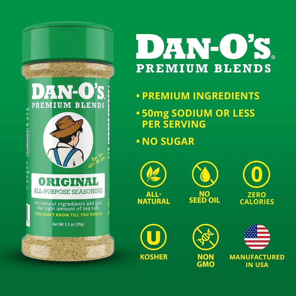A single extra-small Dan-O's seasoning bottle held up to show the flip-top shaker cap and label